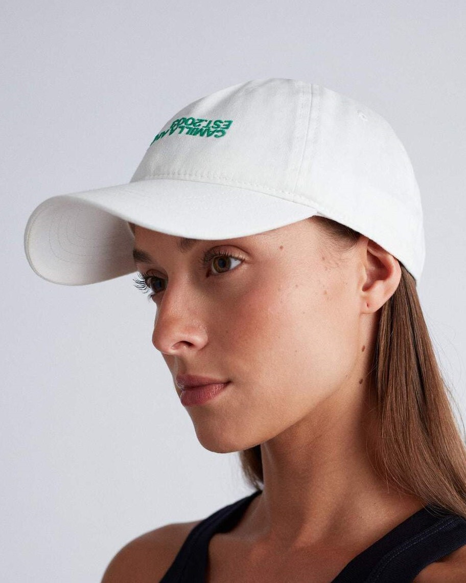 white and green cap